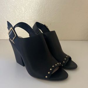 Black open-toed Calvin Klein booties